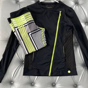 Trina Turk black jacket and matching leggings